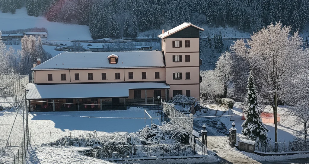 Casa Regina dei Monti e il giardino coperti di neve